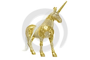 Golden glitter unicorn isolated on white background