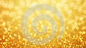 Golden glittering background. Sparkle glitter texture with the bokeh and the lights