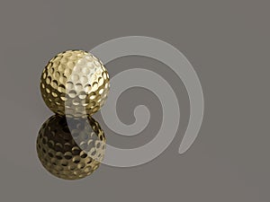 Golden golf ball on reflective background