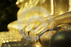 Golden hand buddha statue