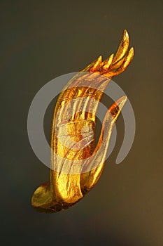 Golden hand statue of Buddha