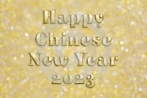 Golden `Happy Chinese New Year 2023` text on festive background