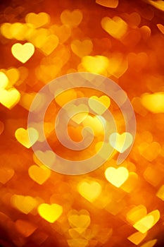 Golden heart bokeh background photo, abstract holiday backdrop