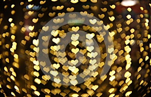 Golden hearts bokeh. Beautiful valentines day background