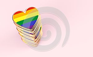 Golden hearts with rainbow flag inside stack or pile. Gay pride, LGBT, bisexual, homosexual symbol concept. Isolated on pastel