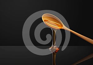 Golden honey dripping from a spoon on a reflective surface minimalist black background
