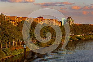 Golden hour alongside the river Meuse in Maastricht with a view on the Bonnefanten museum