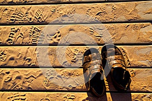 Golden Hour Footprints and Sandals on Michigan Boardwalk Top View