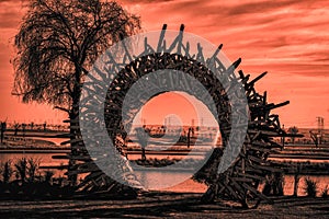 Golden hour at Love Lake overlooking the overlooking the circular wooden monument