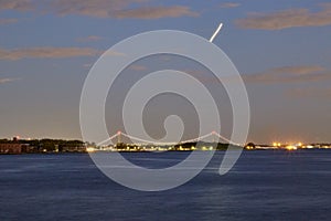 Golden hour night photography of the Verrazano Narrows Bridge as seen from the Battery Park NYC