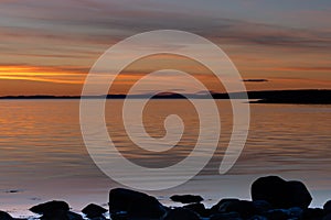 Golden hour over the rocky coast during sunset at Ytre Hvaler National Park in Norway