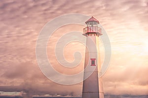 Golden hour shot of Wawatam lighthouse at the harbor of St. Ignace, Michigan in the Straits of Mackinac