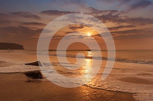 Golden hour sunset at cabo ledo beach,