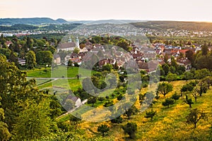 Golden-hour-view to Arlesheim with Arlesheim Cathedral and other parts of Basel-Country, Switzerland