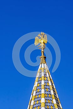 Golden imperial Russian eagle on spire of famous Cathedra
