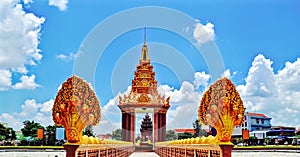 Golden Independence monument, Naga bridge walk way through the monument with beautiful clouds and blue sky background, Ta Keo, Cam