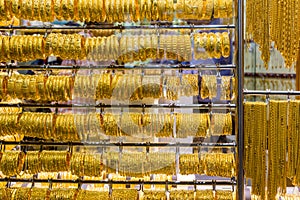 Golden jewelry at the gold street, also called Gold souk, in the city of Dubai, UAE