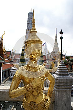 Golden Kinnaree statue, Wat Phra Kaew, Temple of the Emerald Buddha, The Grand Palace, Bangkok, Thailand, Asia