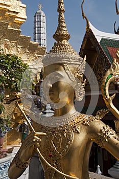 Golden kinnari statue