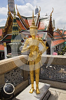 Golden Kinnari statue at Wat Phra Kaew, Bangkok, Thailand