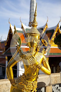 Golden kinnon (kinnaree) statue