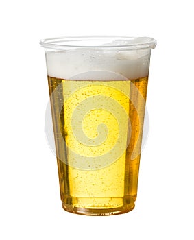 Golden lager or beer in disposable plastic cup photo