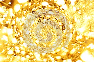 The golden LED light bokeh blurred abstract pattern background