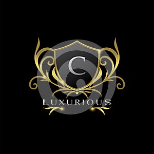 Golden Letter C Luxurious Shield Logo, vector design concept for luxuries business identity
