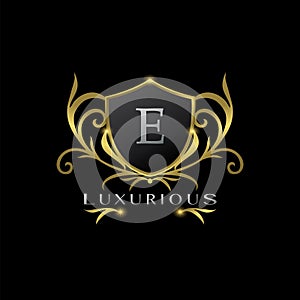 Golden Letter D Luxurious Shield Logo, vector design concept for luxuries business identity