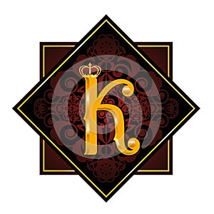 Golden letter K with a royal crown and a floral pattern in a black square