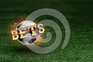 Golden Lettering Bets with soccer ball and green lawn background. Bets, sports betting, watch sports and bet