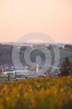 Golden light illuminates the church in Janovice in the Beskydy mountains in the eastern Czech Republic