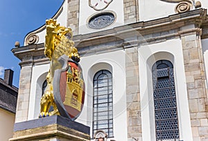 Golden lion and city weapon at the market square of Hachenburg