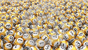 Golden lottery balls stack background. 3d illustration