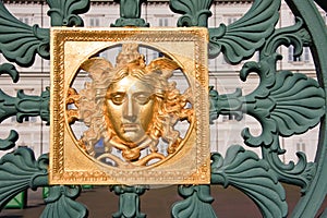 Golden mask on fence - Royal Palace Turin, Italy