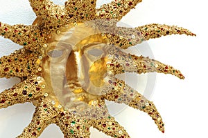 Golden mask of sun