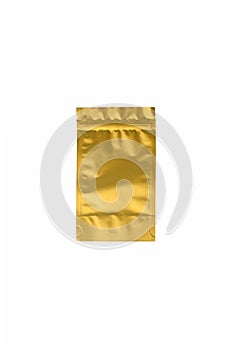 Golden metalized pouch bag fot tea and coffee isolated on white background. Empty blank foil packaging template mockup