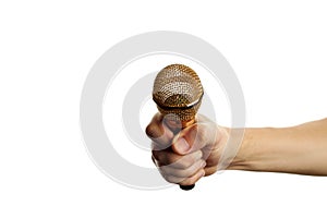 Golden microphone in hand isolated on a white background. copy space. sound recording equipment.
