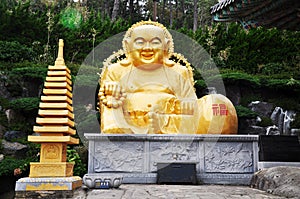 Golden Mireuk-bul statue, Haedong Yonggungsa Temple, Busan, South Korea