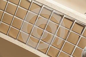 Golden mirrorlike square tile