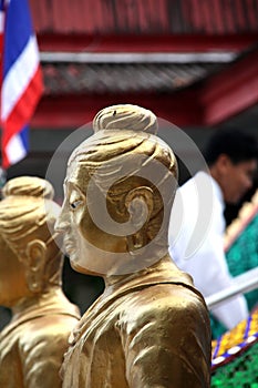 Golden monk statue photo