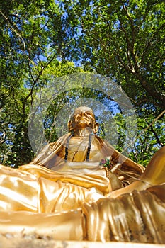 Golden monk statue at Doi Suthep