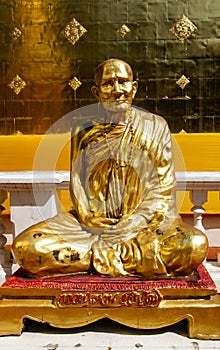 Golden monk statue