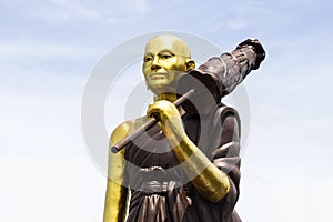 Golden monk statue, Thailand.