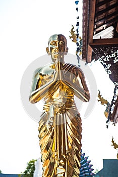 Golden monk statue in Wat Ban Den