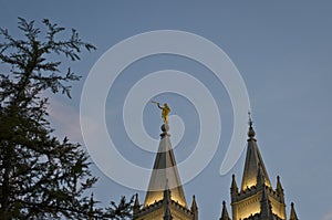 A golden moroni on the top of the salt lake mormon temple