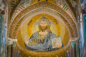 Golden mosaic with Christ Pantocrator in the apse of CefalÃ¹ Cathedral. Sicily, southern italy.