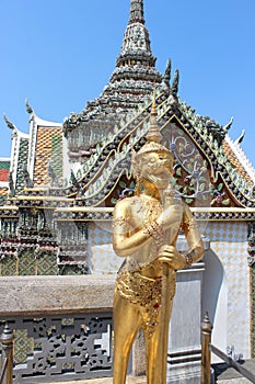 Golden Mythological figure in Wat Phra Kaew temple  Bangkok Thailand photo