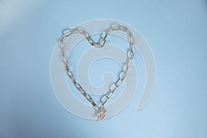 Golden necklace with heart sign