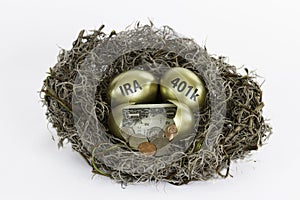 Golden Nest Eggs with one egg broken - IRA and 401k photo